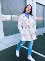 long sleeve mid length cream leather trench coat vintage 1970's with front buttons and tie waists