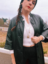 women's vintage 1960's mod black leather jacket buttons up the front 3/4 arm length