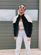 long sleeve jacket with popper buttons 1980's women's black and white with knit, suede, and leather panels