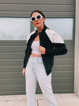 long sleeve jacket with popper buttons 1980's women's black and white with knit, suede, and leather panels