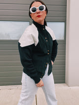 long sleeve jacket with popper buttons 1980's women's black and white with knit, suede, and leather panels