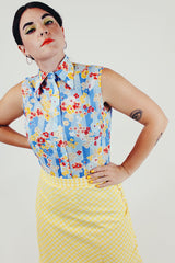 vintage floral button up blouse tucked in