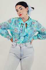 blue long sleeve printed tie neck blouse