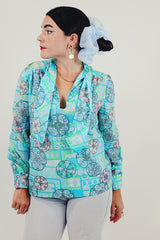 blue long sleeve printed tie neck blouse