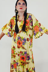 yellow red floral maxi dress with bell sleeves closeup