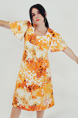 Yellow capped sleeve dress front