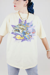 short sleeve white 1985 cosmic tour vintage tee with graphic on the front