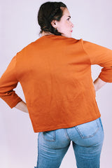 knitted open sweater women's vintage in burn orange with white aztec print