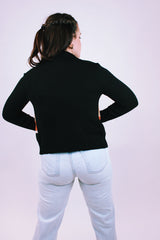 long sleeve women's vintage zip up sweater in black with suede aztec print panelling in the front