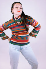 women's vintage long sleeve cowl neck sweater with multi colored stripes and print