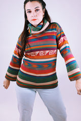 women's vintage long sleeve cowl neck sweater with multi colored stripes and print