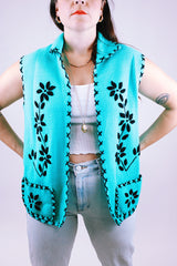 women's vintage blue acrylic sleeveless vest with black flower embroidery and collar