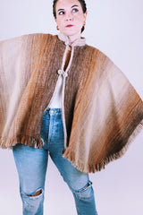 brown wool poncho with mandarin collar and two button closure