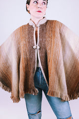 brown wool poncho with mandarin collar and two button closure