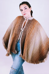brown wool poncho with mandarin collar and two button closure