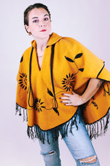 mustard yellow women's vintage wool poncho with black fringe and small collar and embroidered flowers