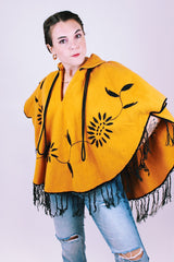 mustard yellow women's vintage wool poncho with black fringe and small collar and embroidered flowers