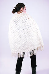 women's 1970's vintage cream acrylic knitted crochet poncho with fringed hem, collar, and buttons
