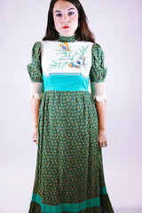 1970's vintage prairie dress in green ditsy floral print, crochet sleeves mock neck embroidered butterflies on chest