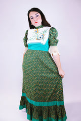 1970's vintage prairie dress in green ditsy floral print, crochet sleeves mock neck embroidered butterflies on chest