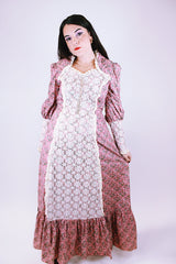 women's vintage 1950's prairie dress in pink with ditsy floral print and cream crochet lace throughout ties waist and tie bust maxi with ruffle hem