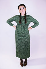 long vintage 1960's green dress with ditsy floral print long sleeves and crochet trim at neck and cuffs