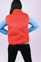 women's vintage red puffer quilted cotton vest with ditsy floral print zips up the front