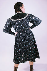 vintage 1970's gunne sax dress with long sleeves in black with ditsy floral print has lace trim and mock neck