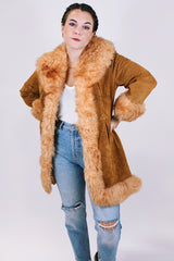 women's vintage 1970's suede leather jacket with faux fur around edges, hem, and cuffs