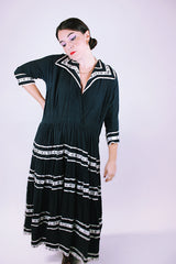 1950's vintage women's dress black with white and silver metallic ribbon applique throughout