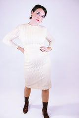 women's vintage 1960's cream crochet dress with long sleeves and midi length