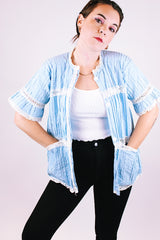 short sleeve baby blue 1970's women's vintage button up blouse with crochet lace throughout