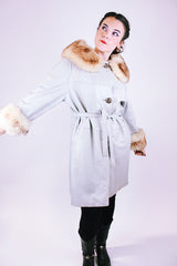 women's vintage 1970's light grey leather coat with faux fur collar and cuffs and tie waist