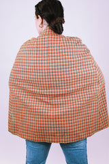 women's vintage tartan printed poncho in tan and red with buckle closure and mandarin collar