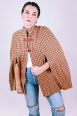 women's vintage tartan printed poncho in tan and red with buckle closure and mandarin collar