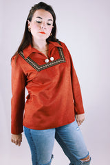 long sleeve pullover blouse in a soft faux suede burnt orange fabric with collar