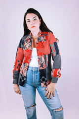 women's vintage 1970's long sleeve button up blouse in a navy and red patchwork print polyester