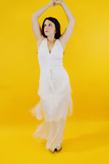 sleeveless ankle length 1970's vintage flapper style dress with three tiers of fringe and tie waist