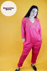long sleeve hot pink jumpsuit with jewels around neckline and cuffs vintage 1980's