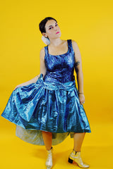 sleeveless blue metallic 80's prom dress with high low hem