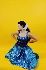 sleeveless blue metallic 80's prom dress with high low hem