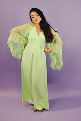 long teal dress with big sheer ruffle bell sleeves and a tie waist vintage 1970's