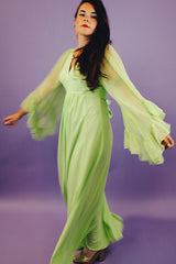 long teal dress with big sheer ruffle bell sleeves and a tie waist vintage 1970's