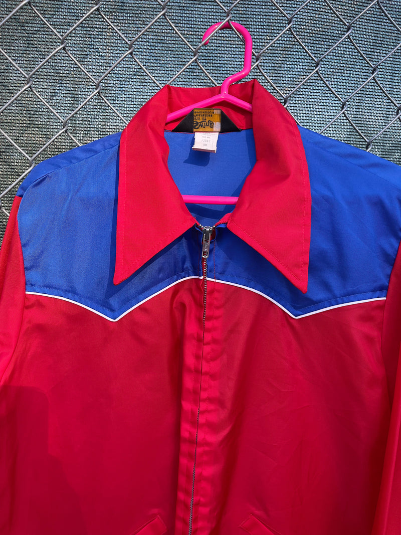 Women's or men's vintage 1970's Swingster, World of Wearables label long sleeve blue and red lightweight zip up windbreaker with a western style. 