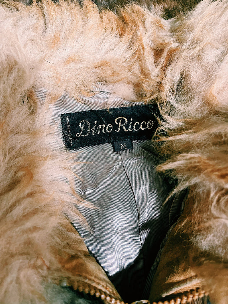 Women's vintage 1980's Dino Ricco, Made in Hong Kong label long sleeve zip up brown genuine fur coat with cream fur neckline.