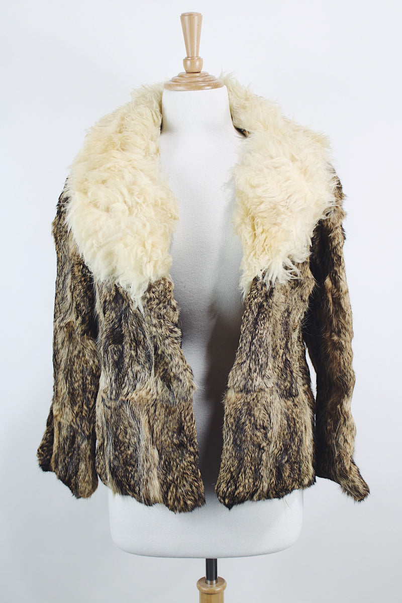 Women's vintage 1970's Dino Ricco, Made in Hong Kong label Penny Lane long sleeve genuine fur coat with a brown body and big cream fur trim on neck.