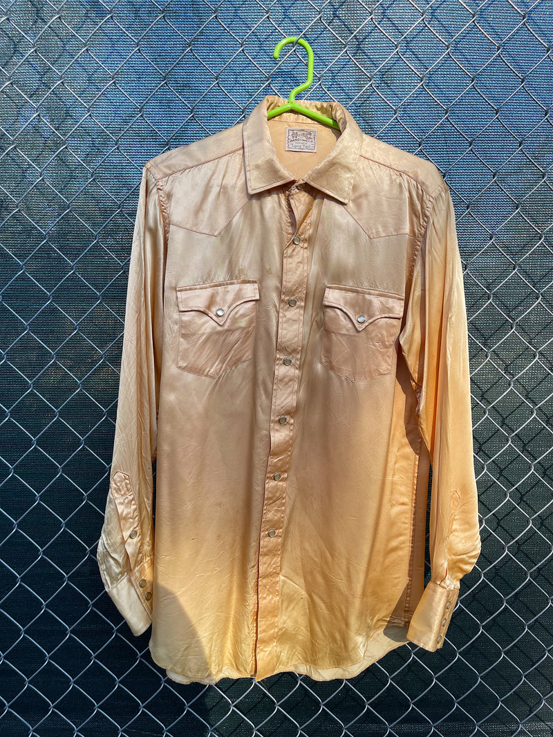 Men's vintage 1950's H Bar C Ranchwear, Long Tail label long sleeve western shirt in satin yellow color with pearly snap buttons. 