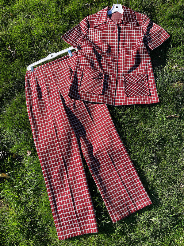 Women's vintage 1970's matching pant set with pants and a short sleeve button up shirt in maroon and white checkered print. 