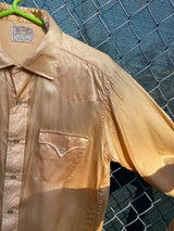 Men's vintage 1950's H Bar C Ranchwear, Long Tail label long sleeve western shirt in satin yellow color with pearly snap buttons. 