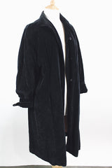 Women's vintage 1950's "365" by All-State label long sleeve knee length black velvet duster jacket with button front closure and pink satin liner.